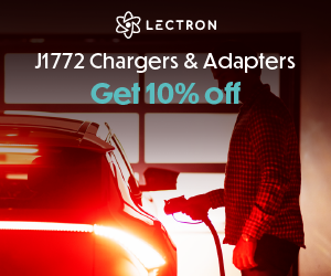 Lectron charger in a garage scene with red lighting